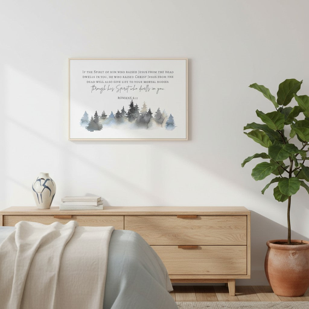 Watercolor evergreen forest Christian canvas wall art, Romans 8:11, displayed in cozy neutral living room.