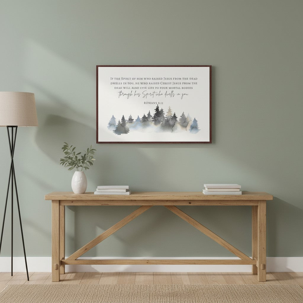 Romans 8:11 watercolor forest canvas displayed above a console table in a bright room.