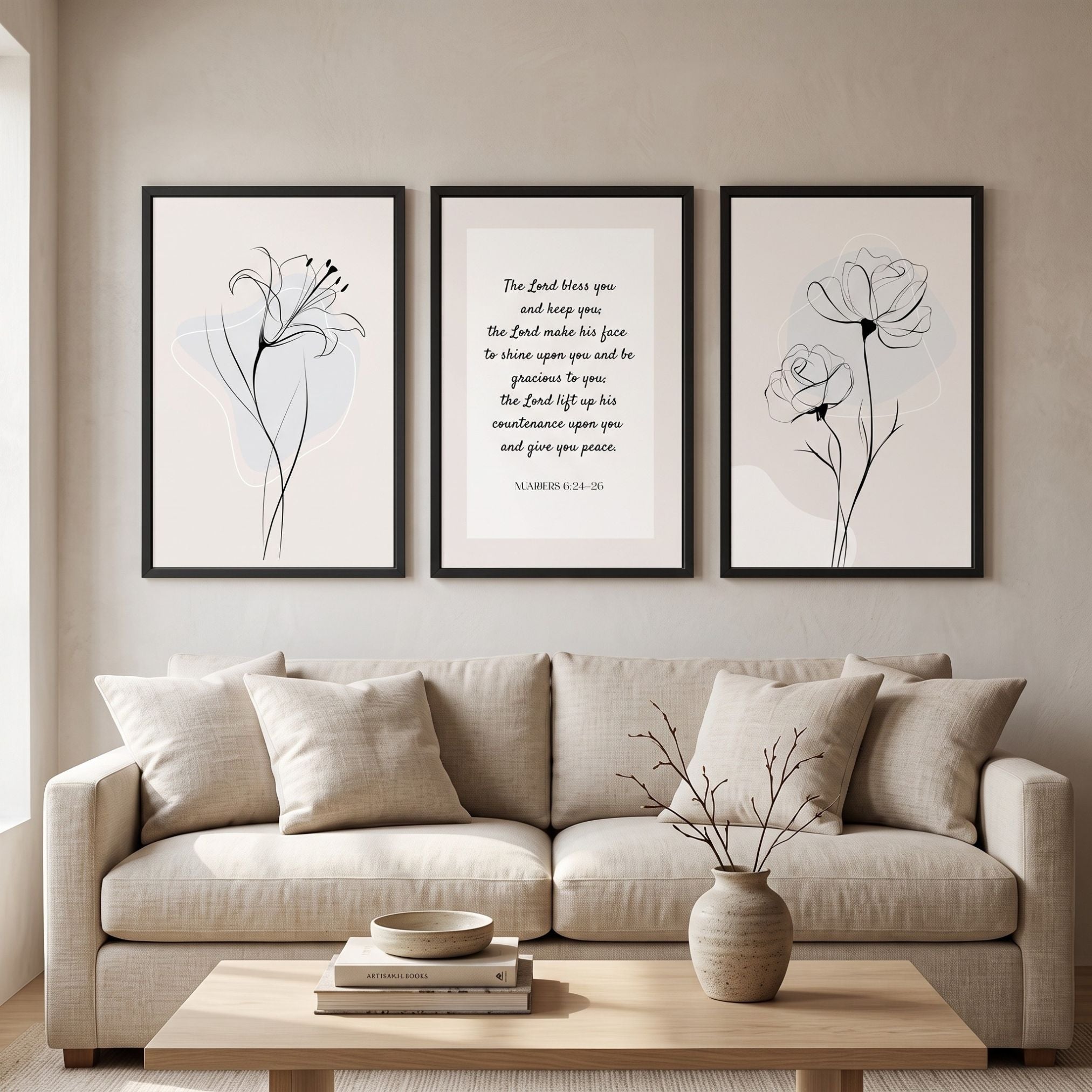 A three-piece Christian gallery wall set featuring minimalist black line art on neutral beige backgrounds. The center print displays "The Lord bless you and keep you" from Numbers 6:24-26 in elegant typography, flanked by a lily line drawing on the left and a poppy line drawing on the right, all in black frames above a beige sofa.