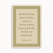 Minimalist Romans 15:13 Scripture wall art featuring the Bible verse "May the God of hope fill you with all joy and peace" in elegant sage green typography for modern Christian home decor.