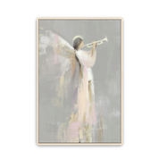 Angel with trumpet Christian Christmas artwork on a neutral wall with soft gold and cream tones.