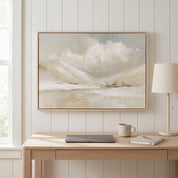 Framed vintage Christian winter landscape wall art titled Be Still and Know with Psalm 46:10 verse, displayed on a white paneled wall above a light wood desk in a modern home office.