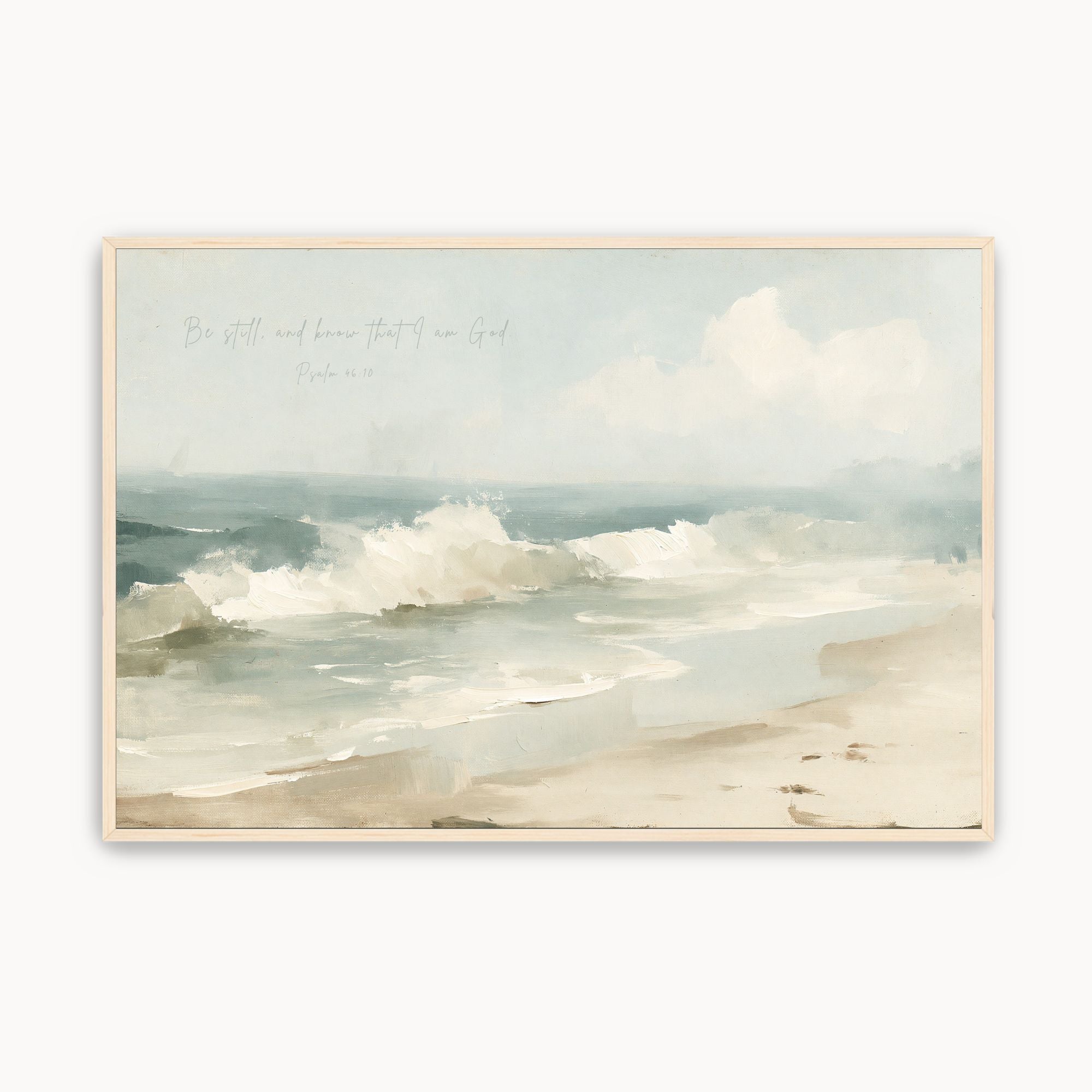 Vintage Psalm 46:10 Christian wall art featuring a calm coastal beach landscape canvas print with handwritten script scripture, crashing ocean waves, sandy shore, and a maple wood frame.