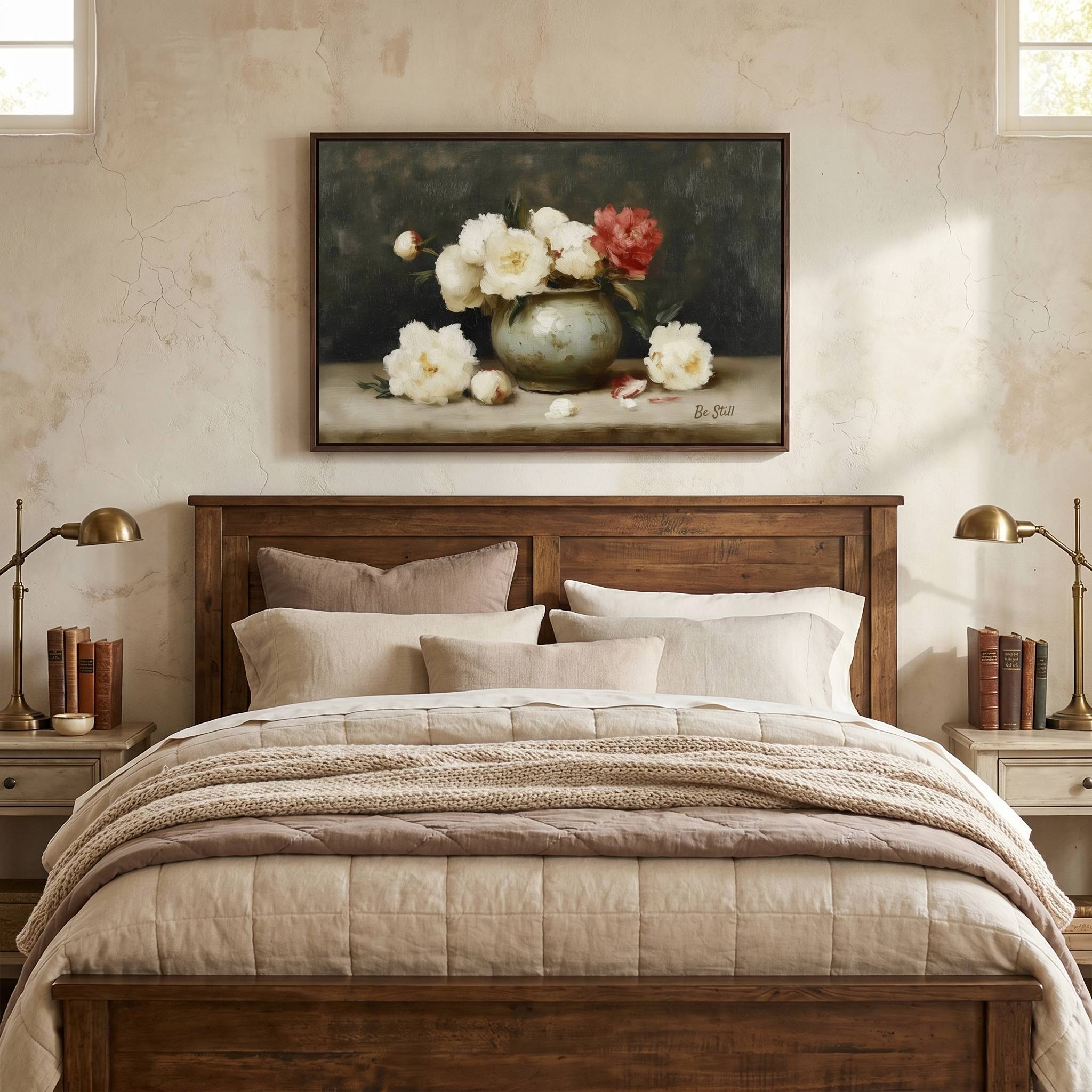 Be Still | Psalm 46:10 Christian wall art displayed above a wooden bed in a cozy farmhouse bedroom, featuring vintage floral artwork that inspires peace, trust, and quiet reflection.