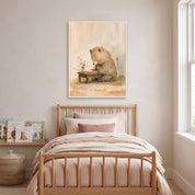 Framed Be Thankful praying bear Christian kids wall art above a wooden bed with blush bedding, beside children’s books in a soft neutral bedroom.