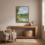 Framed Beside Still Waters Christian wall art displayed on a beige living room wall above a wooden console table and cozy armchair.