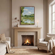 Framed Beside Still Waters Christian wall art displayed above a light wood fireplace mantel in a modern living room featuring a serene river landscape watercolor.