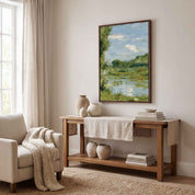 Framed Beside Still Waters Christian wall art displayed in a modern living room above a wooden console table with serene river landscape watercolor.