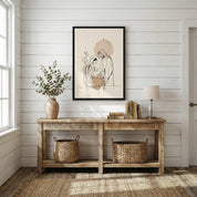 Minimalist Birth of Jesus wall art above rustic console table in neutral decor