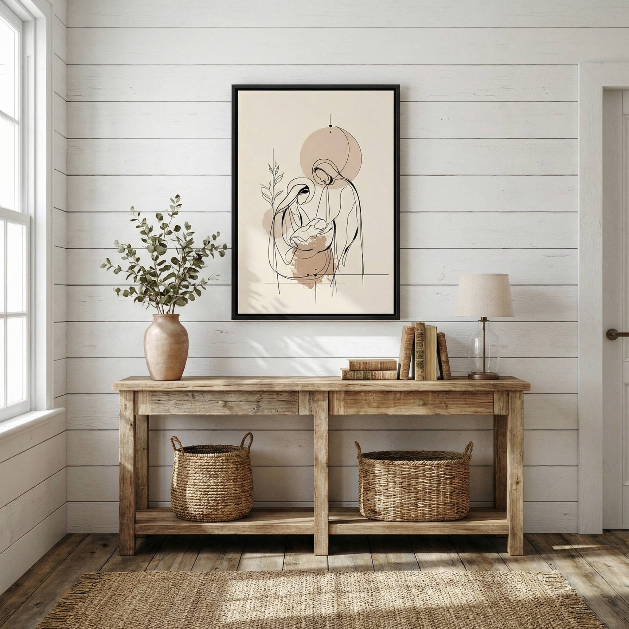 Minimalist Birth of Jesus wall art above rustic console table in neutral decor