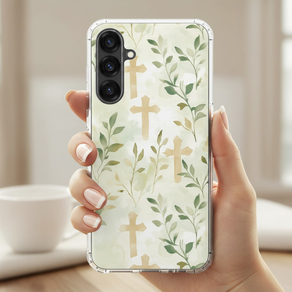Botanical cross Samsung phone case with green leaves forming cross pattern held in hand in soft natural light minimalist Christian faith design