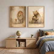 Two framed neutral Christian kids wall art prints displayed above a wooden media cabinet and bed, featuring a lion and cub on the left and a bear family on the right in a boy's bedroom.