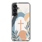 Minimalist Christian Samsung Galaxy s25 case featuring a central tan cross over an abstract landscape of blue, beige, and orange shapes with delicate botanical leaf accents on a white background