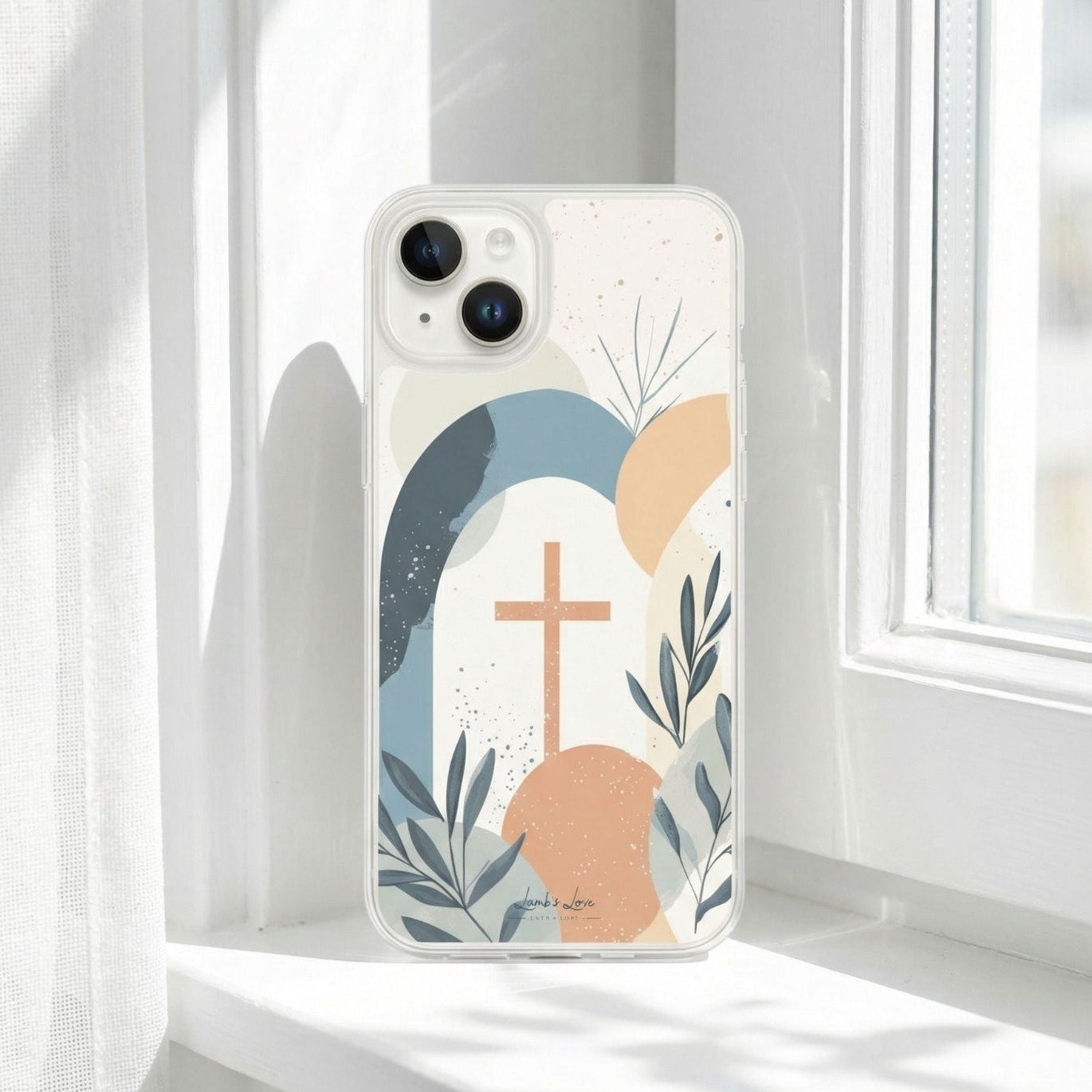 Modern Christian Phone case with cross design on a white surface near a window