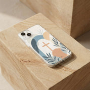 Phone case with cross and leaf design on a wooden block