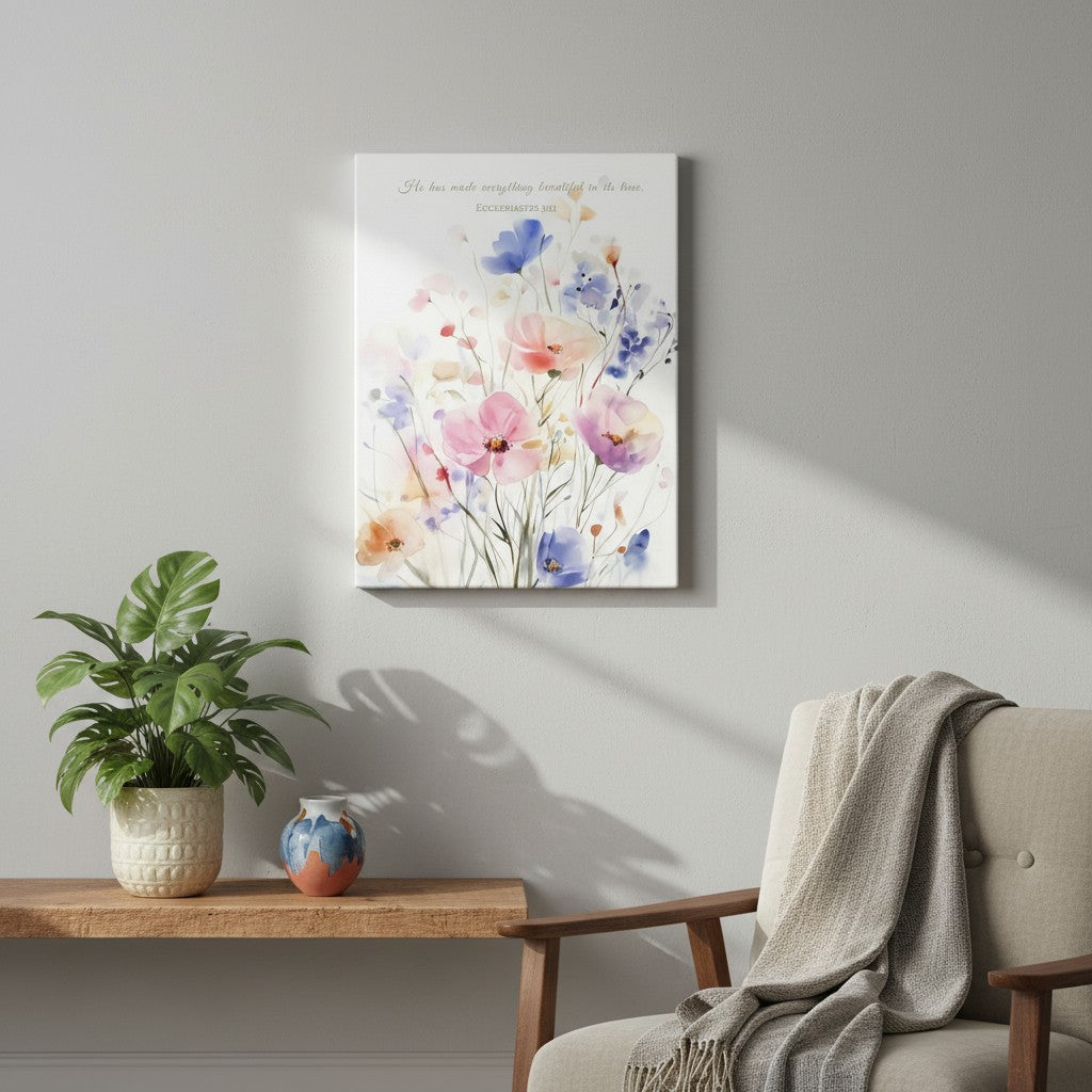 Watercolor floral Christian canvas wall art with Ecclesiastes 3:11 verse hanging in a cozy living room with wooden bench and potted plants.