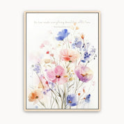 Ecclesiastes 3:11 watercolor floral Scripture wall art with the verse ‘He has made everything beautiful in its time’ above pastel wildflowers in pink, blue and lavender.
