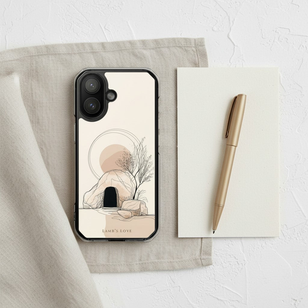 Empty Tomb Christian MagSafe iPhone case on neutral linen desk setup with notebook and pen featuring minimalist resurrection-inspired artwork and modern aesthetic