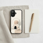 Empty Tomb Christian MagSafe iPhone case on neutral linen desk setup with notebook and pen featuring minimalist resurrection-inspired artwork and modern aesthetic