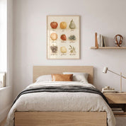 Framed Fruit of the Spirit watercolor Christian wall art above a wooden bed with cream bedding and a dark throw in a neutral youth bedroom.