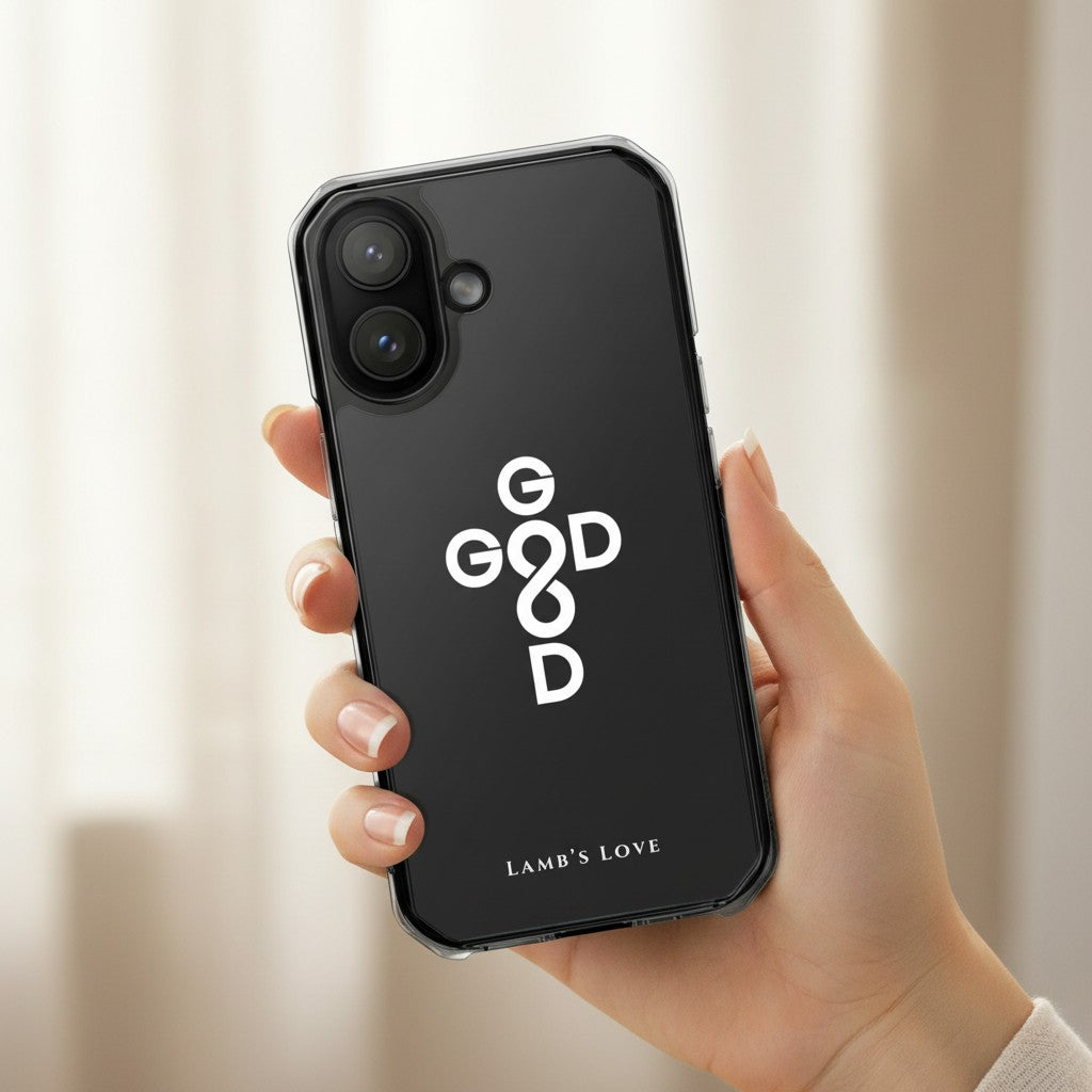 God Is Good Christian cross MagSafe iPhone case held in hand against a soft neutral background