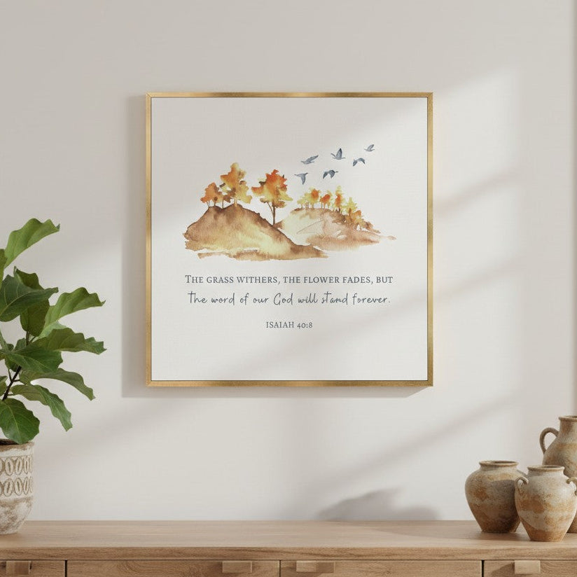 Framed artwork on a wall above a wooden console table with decorative vases and a plant.