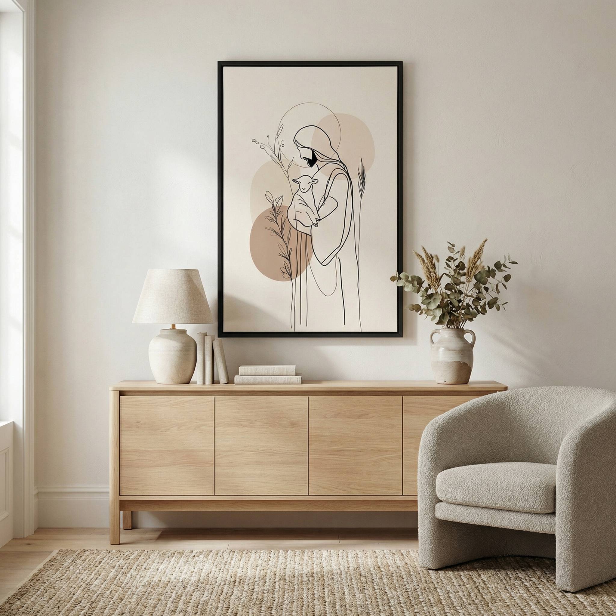 Modern minimalist Good Shepherd Christian wall art in beige tones above wooden sideboard