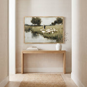 Beside Still Waters | The Good Shepherd Christian wall art displayed above a wooden entryway console table, featuring Jesus leading His sheep beside still waters, inspired by Psalm 23 and symbolizing Christ's peace, guidance, and faithful care.
