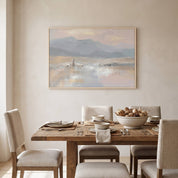 Framed Good Shepherd wall art showing Jesus leading His flock above a dining table in a soft organic modern room.