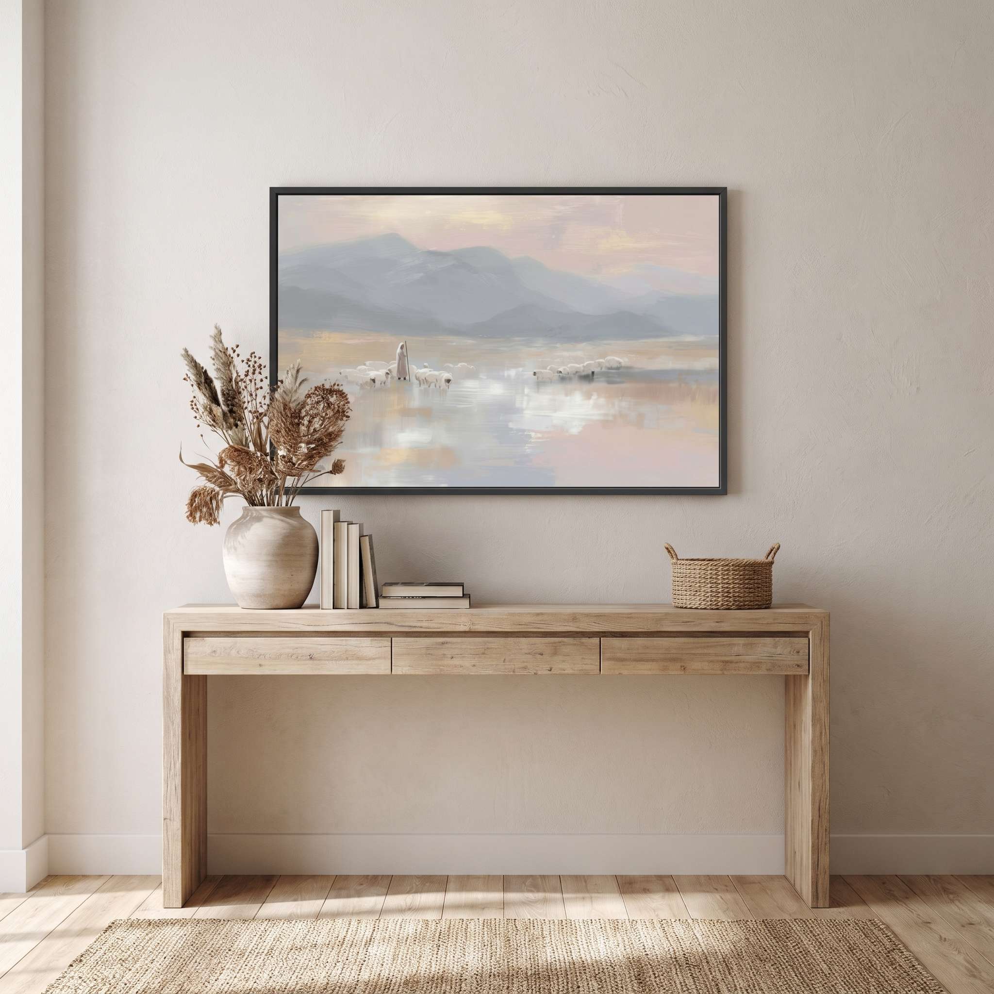 Jesus the Good Shepherd with His sheep wall art above a dining table on a warm terracotta wall, in soft watercolor landscape tones.