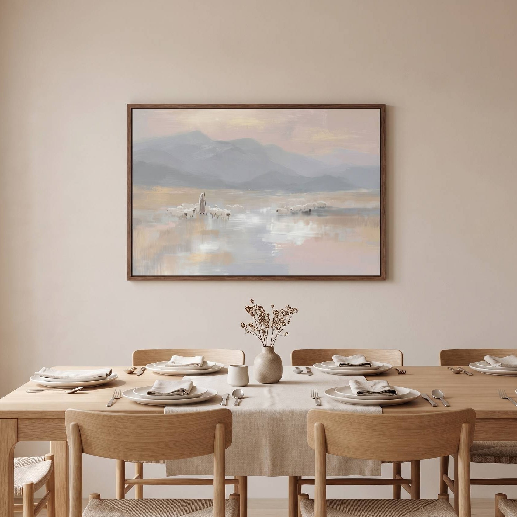 The Good Shepherd with His Sheep Christian wall art by Lamb's Love, featuring Jesus guiding His flock in soft watercolor tones, framed above a dining table set in a soft organic modern dining room.