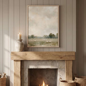 Framed He Restores My Soul Christian sheep landscape wall art above a rustic stone fireplace with a wooden mantel, candle and woven baskets.