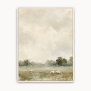 He Restores My Soul Christian landscape wall art showing sheep grazing in a meadow beneath an expansive cloudy sky, displayed in a light wood frame.