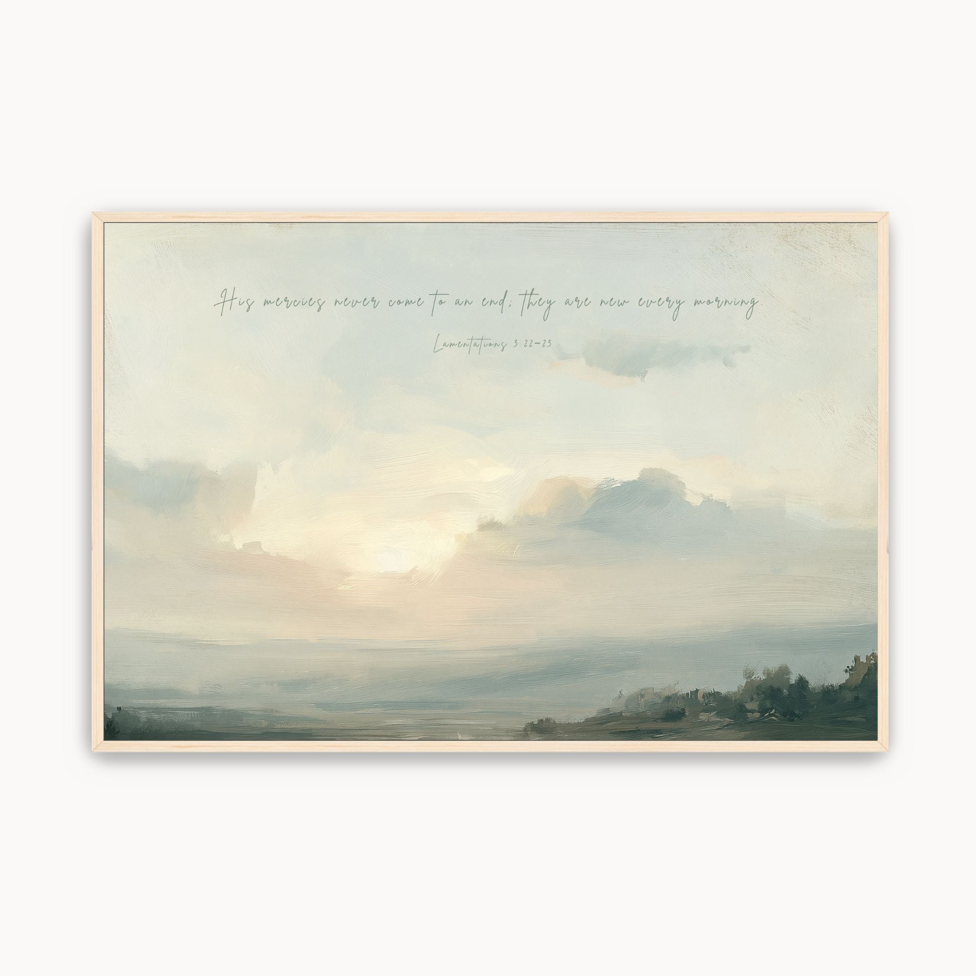 Vintage Lamentations 3:22-23 Christian wall art featuring a soft sunrise landscape canvas print over rolling hills with handwritten script scripture and a maple wood frame.