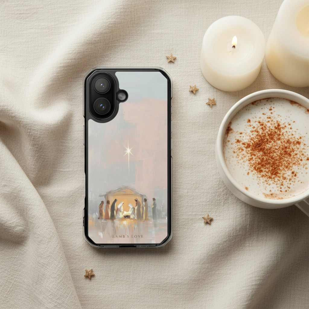 Holy Night Jesus Born MagSafe® clear iPhone case featuring soft watercolor nativity artwork with Mary, Joseph, and baby Jesus displayed beside warm cocoa, candles, and cream linen fabric in a cozy Christian Christmas aesthetic setting