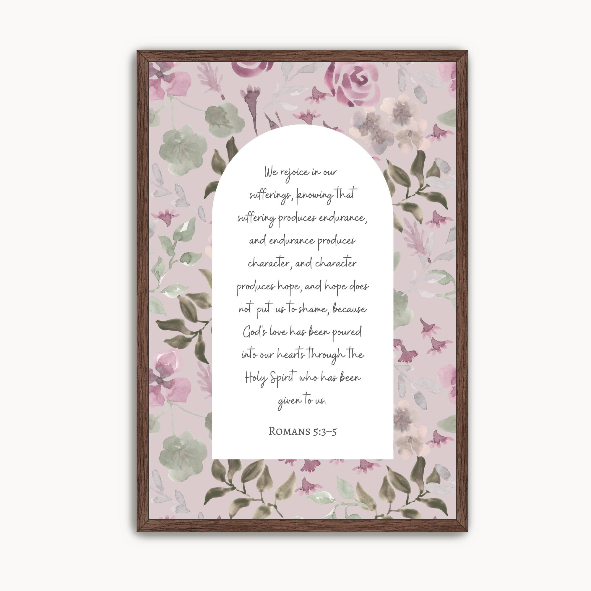 Christian Scripture wall art featuring Romans 5:3–5, "Hope does not put us to shame," displayed inside an elegant arched design with soft watercolor pink, lavender, and sage floral accents. Inspirational Bible verse artwork for the living room, bedroom, prayer room, or office.