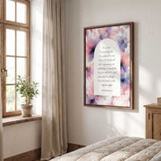 Framed vintage Christian floral wall art titled Isaiah 40:28–31 featuring "Those who hope in the Lord" with watercolor botanical artwork, displayed in a wood frame on a wall next to a tall window in a bright rustic bedroom.