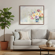 Isaiah 41:10 Fear Not Christian wall art with watercolor peonies displayed above a neutral living room sofa beside a leafy potted plant.