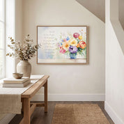 Isaiah 41:10 Fear Not Christian wall art with watercolor peonies above a wooden entryway bench with books and a vase in a bright hallway.
