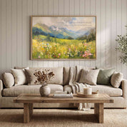 Framed Isaiah 55:12 Christian landscape wall art by Lamb's Love, featuring a colorful wildflower mountain scene above a sofa in a modern living room.