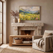 Isaiah 55:12 Christian mountain wall art with a colorful wildflower meadow, displayed above a stone fireplace in a cozy living room.