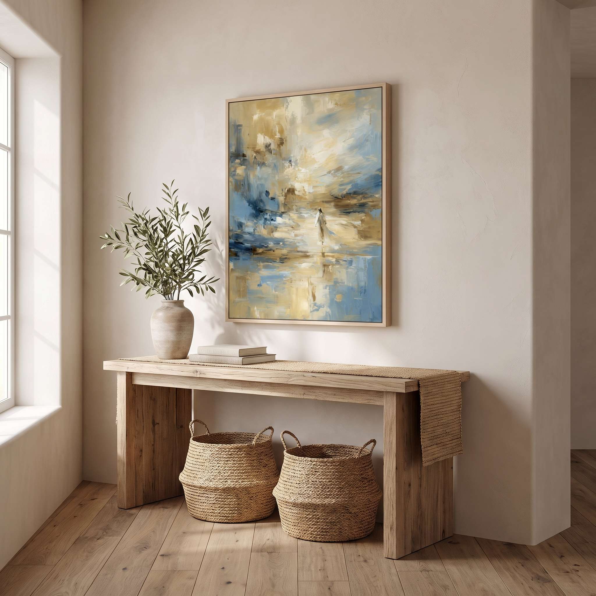 Framed abstract Jesus Calms the Storm canvas wall art hanging above a rustic wood console table with woven baskets in a bright entryway.