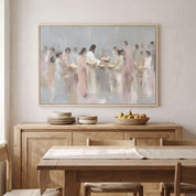 Framed Jesus Feeding the 5000 wall art above a dining room sideboard, showing Jesus sharing bread with the gathered crowd in soft watercolor tones.