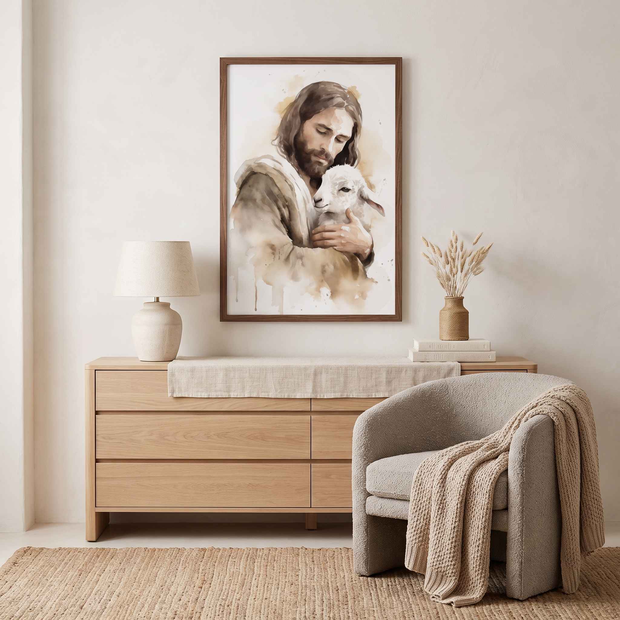 Jesus the Good Shepherd holding a lamb in Christian watercolor wall art above a light wood dresser in a cozy neutral bedroom.