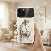 Jesus the Good Shepherd sketch Christian MagSafe iPhone case held in hand with warm neutral indoor lifestyle aesthetic and faith-inspired artwork of Jesus holding a lamb