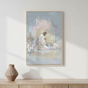 Watercolor painting of Jesus praying in the garden displayed in a light, minimal home setting.