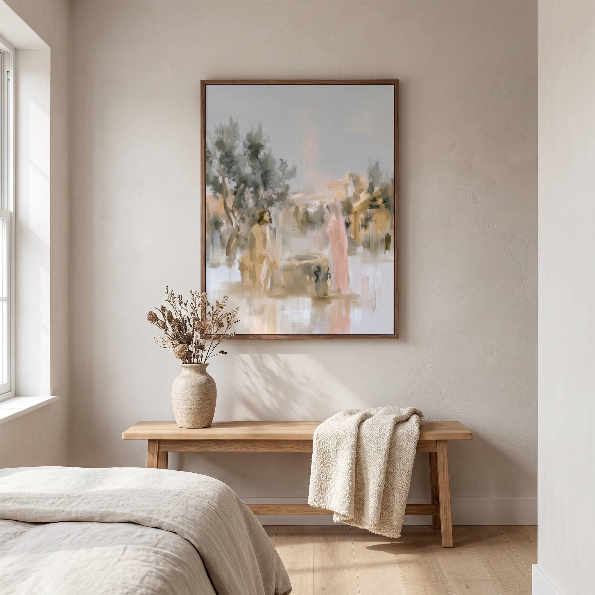 Watercolor Jesus and the Samaritan woman wall art above a natural wood bedroom bench with a cream throw and dried flowers, inspired by John 4 and living water.