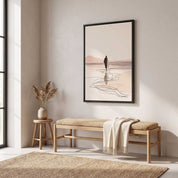 Minimalist line art print of Jesus walking on water framed in black above a wooden bench in an entryway with neutral beige tones.