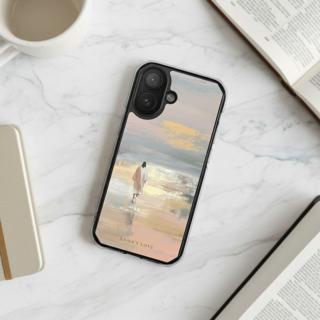 Jesus Walking on Water MagSafe® clear iPhone case displayed on a white marble surface beside a coffee mug and open book in a calm minimalist setting