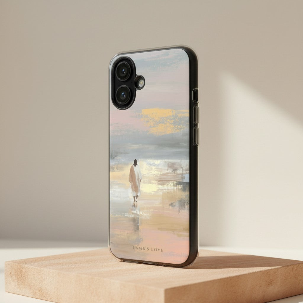 Jesus Walking on Water MagSafe® clear iPhone case with peaceful Christian artwork of Jesus walking along reflective water at sunset, displayed on a wooden platform in a minimalist studio setting